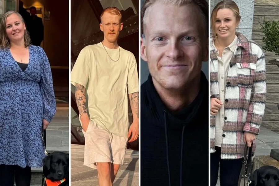 Fire personer som ser mot kameraet