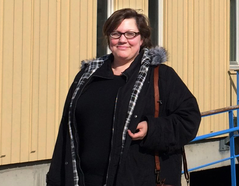 En person med briller