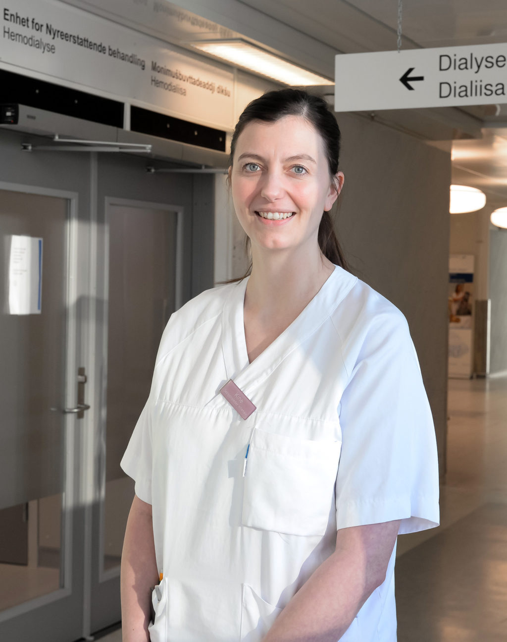 En person i hvit skjorte