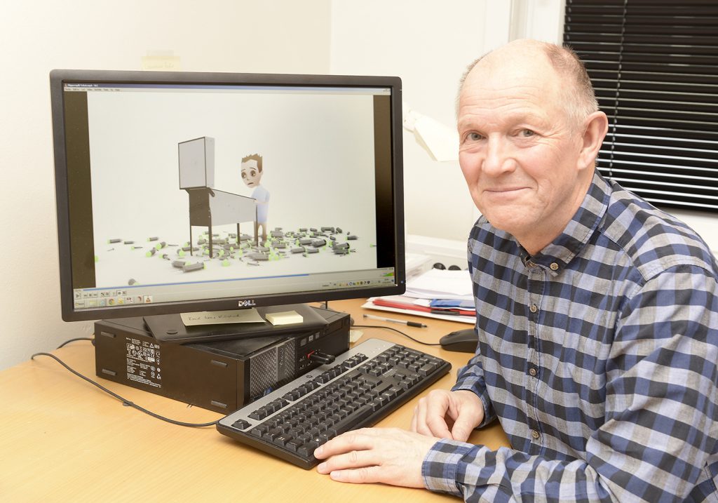 Terje Simonsen har laget animasjonsfilmen med et flipperspill som illustrerer hvordan rusmidler kan gjøre deg avhengig og skade hjernen. Foto: Per-Christian Johansen