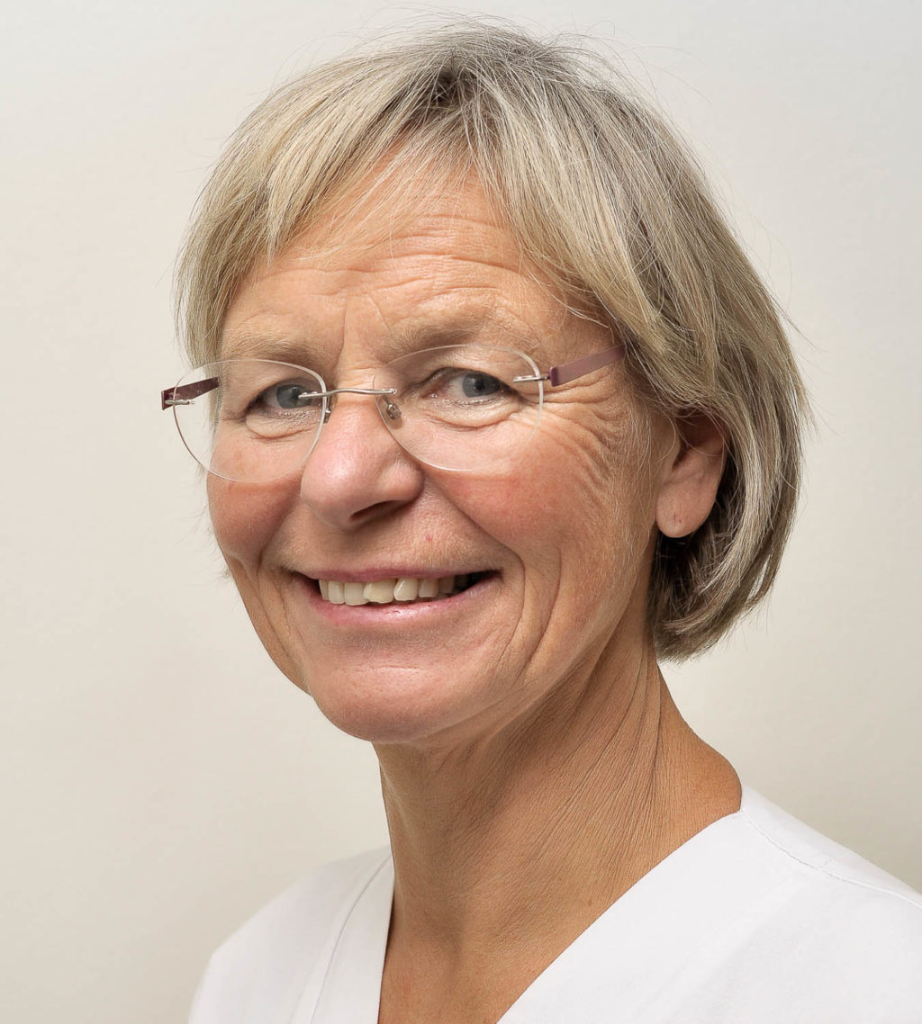 Et nærbilde av en mann som smiler