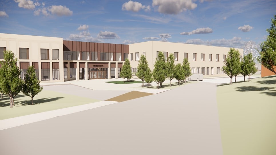 En bygning med trær foran