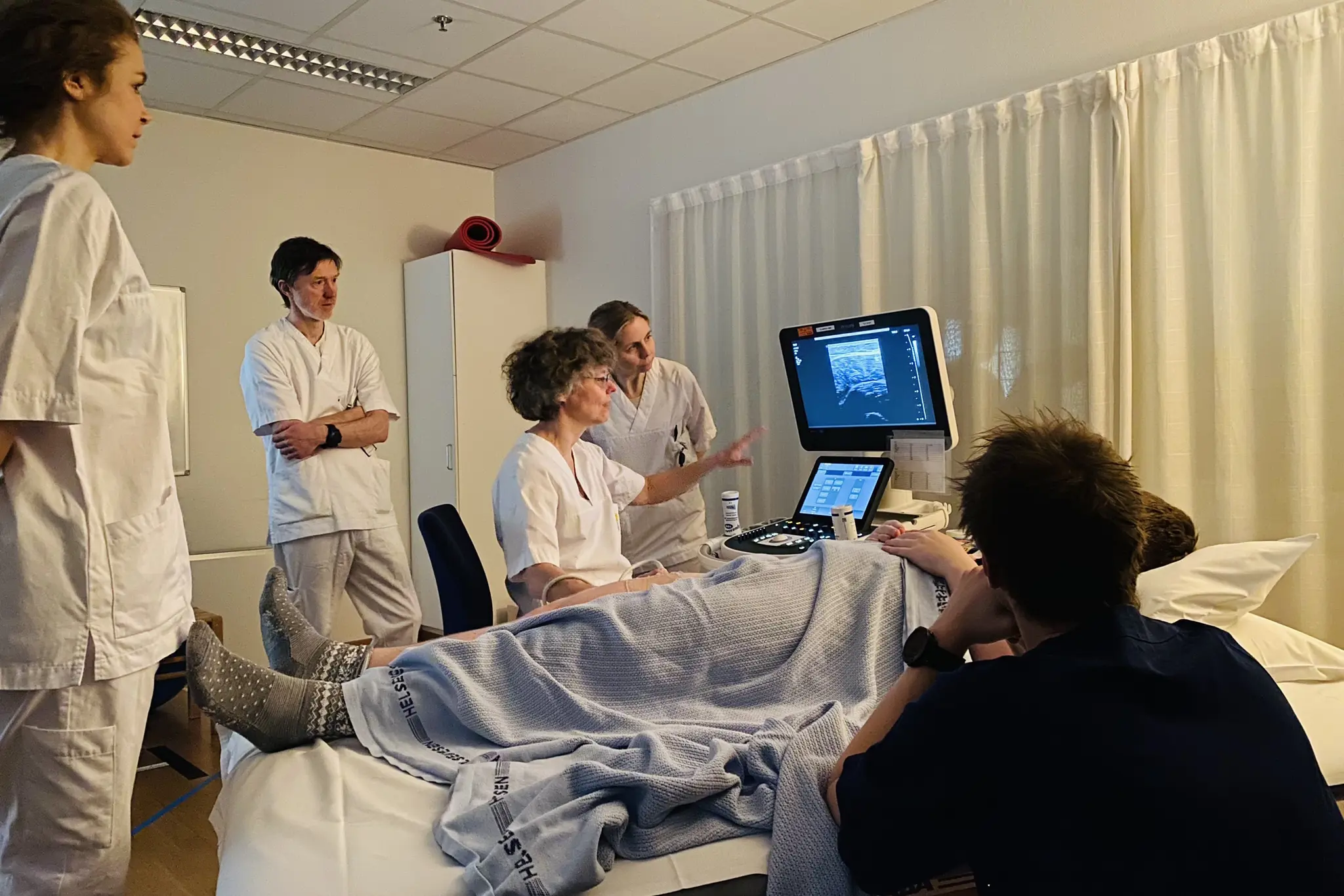 En gruppe mennesker på et sykehus