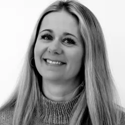 En person som smiler for kameraet