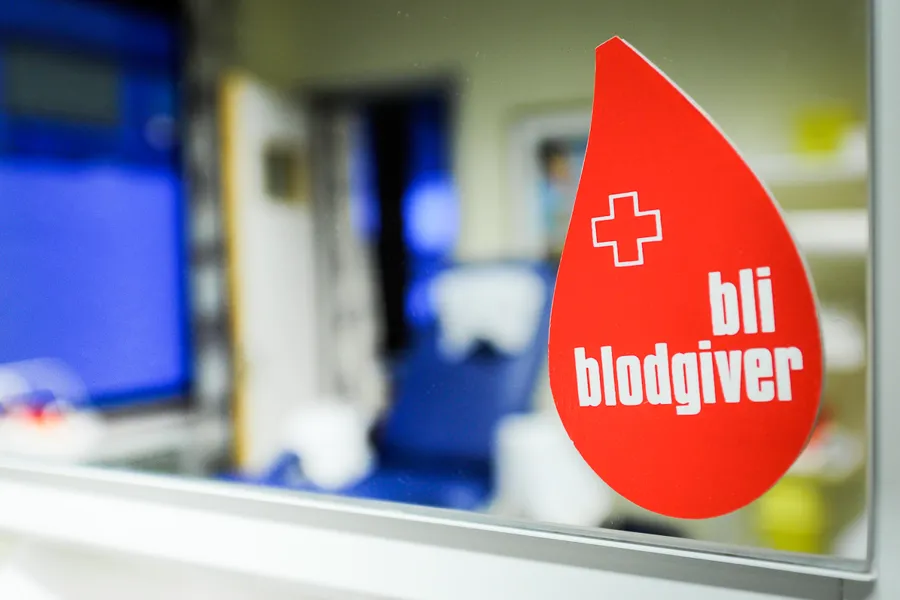 Skilt med oppfordring til å gi blod