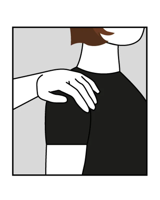 En hånd som holder et forstørrelsesglass