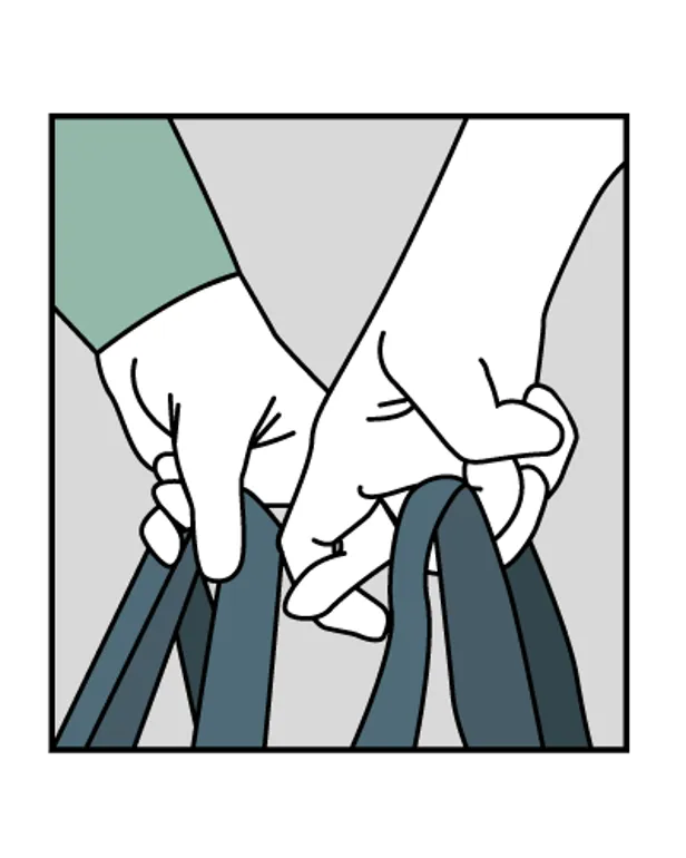 En person som holder et skilt