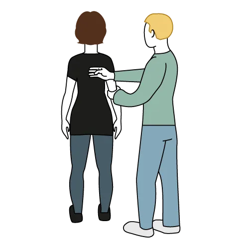 Et par personer iført masker