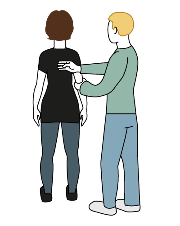 Et par personer iført masker